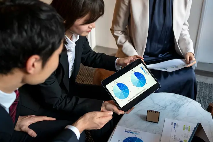 Business people working with ipad side view 23 2150103553